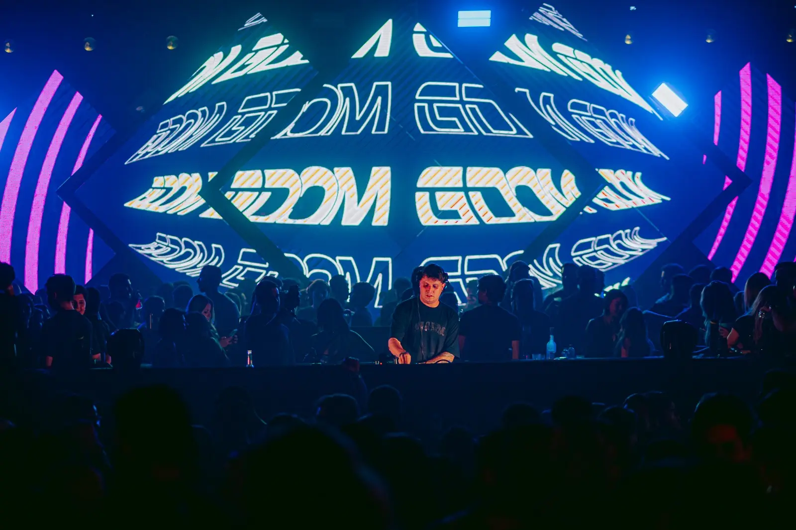 G DOM performing a Tech House DJ set on stage